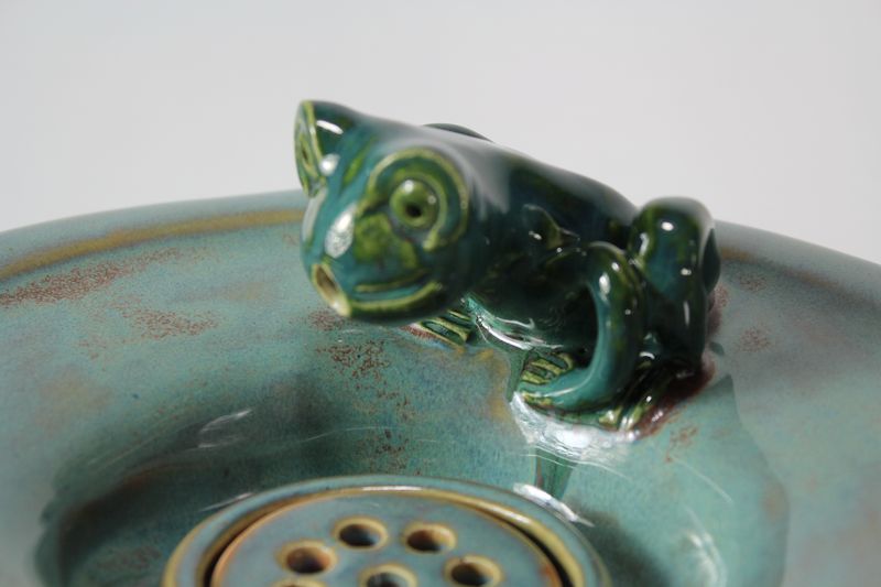 pet drinking fountain with a large secured coon lid and frog spout