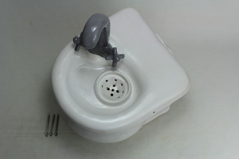 cordless pet drinking fountain PF19016 with a faucet spout and internal battery compartment